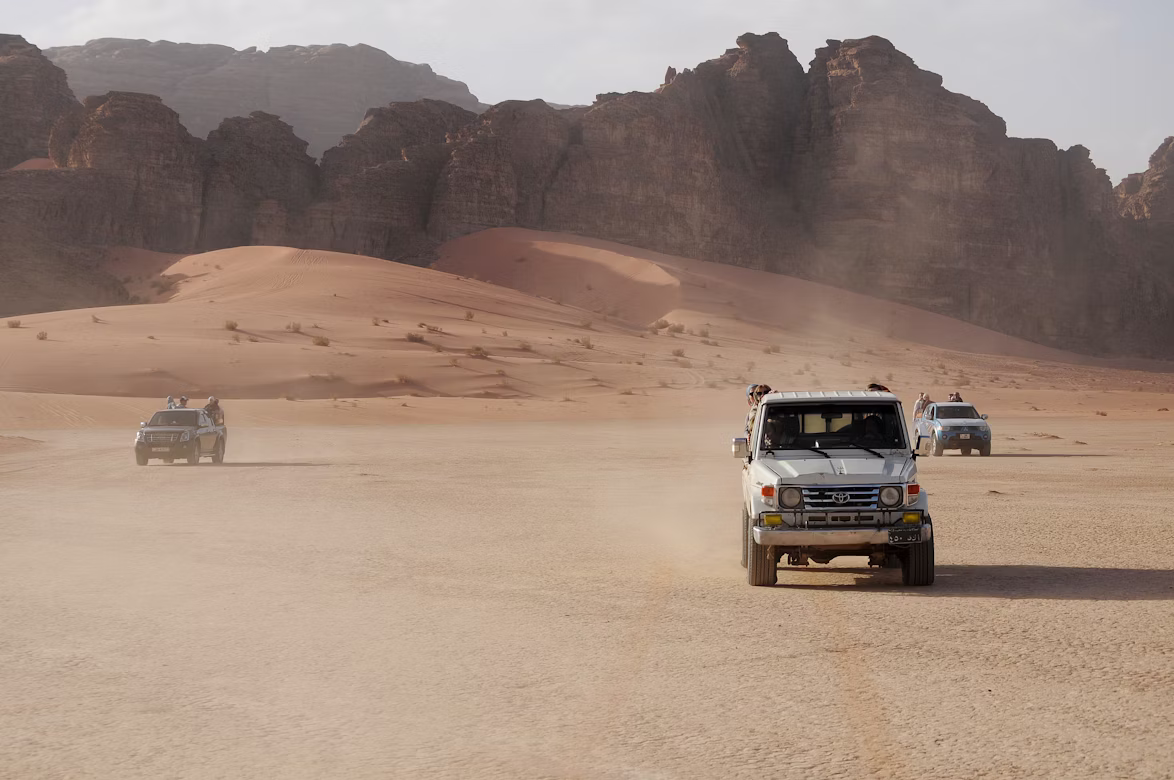 Tour vehicle on the Desert Highway from Amman to Petra in Jordan
